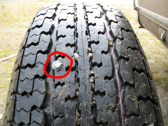 A metal screw in the new tire