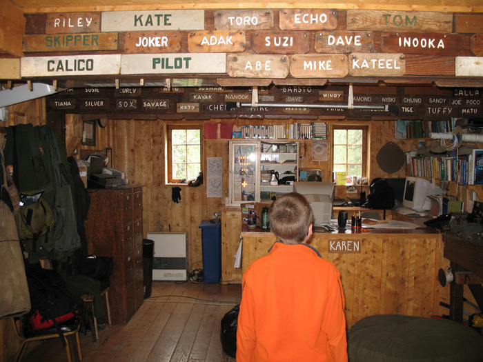 Karl looks at the names of many sled dogs from their camp