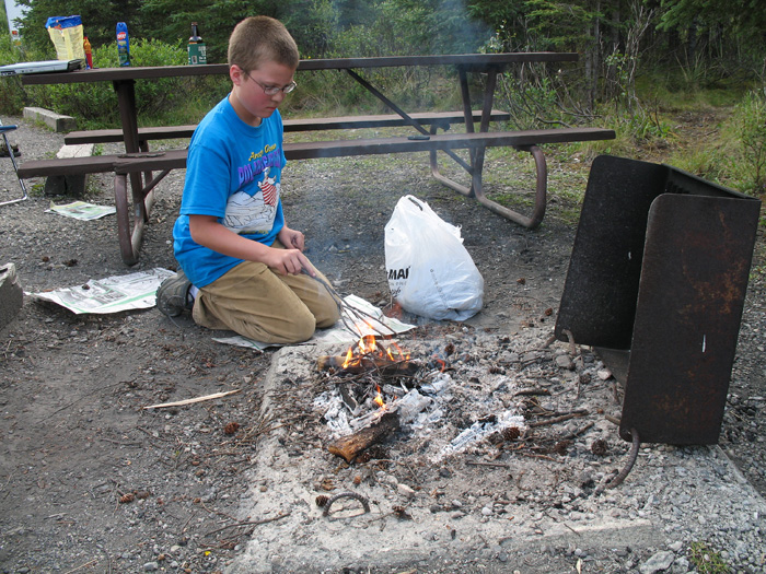 Karl is getting a fire started