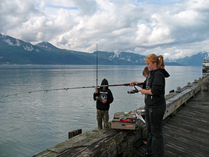 Erik and Isabella, fishing off the dock in Valdez, AK