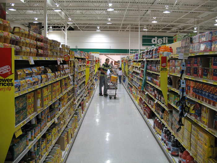 Erik is rolling a cart around at Extra Foods in Squamish, BC