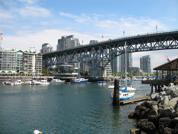 Water separates Granville Island with the rest of Vancouver
