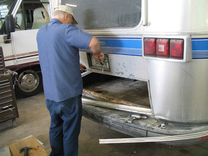 A metal specialist is starting to tear apart my rear