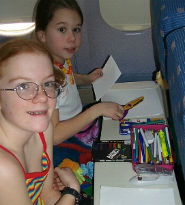 Izzy and Morgane on the plane to San Juan