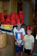 Trying out cool hats in Morroccan pavilion