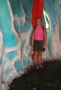 Lilly posing in the ice tunnel (snow on the ground)