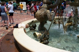 Karl plays in a fountain after the Muppet 3D show